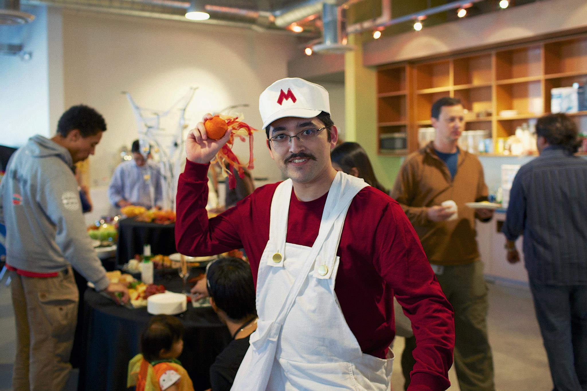 Ernesto dressed as NES Fire Mario for Halloween